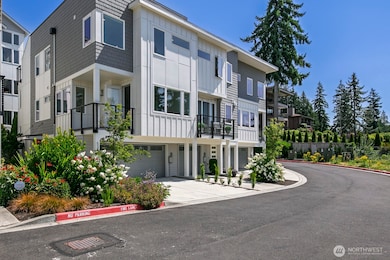 This is an end unit and the entry is ti the left of the 2 car garage.