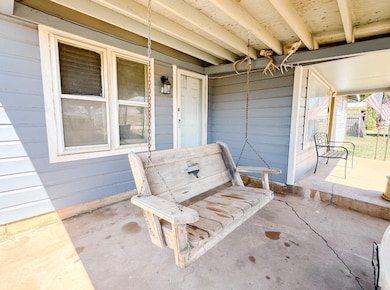 View of patio with a porch