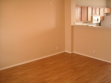 Empty room featuring wood finished floors