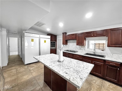 Kitchen featuring stainless steel appliances, a ki