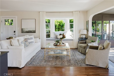 Extra touches like this inviting bay window give this home unique charm.