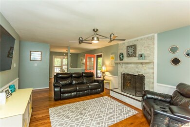 Living Room with Brick Fire Place