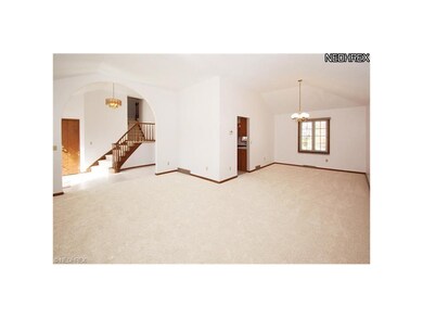 Neutral formal Living Room and Dining Room with dr