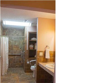 Easy handicap access to shower and the rest of bat