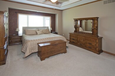 MASTER SUITE WITH BUILT IN TV SHELF AND DRAWERS