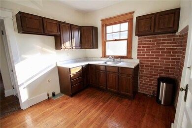 Bright and cozy kitchen with access to back patio.