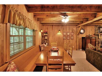 Dining Room. CHURCH PEW DINING ROOM, OPEN TO KITCH