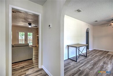 Spacious living area to the right of front door