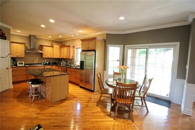 View of kitchen with breakfast area that open to c