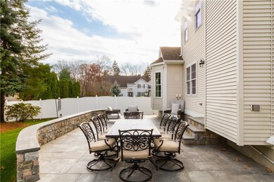 Brand new grantie patio with stone walls capped wi