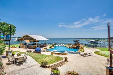 View of swimming pool with a patio area, an in gro