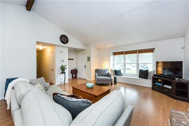 Open family room/great room with vaulted ceilings!