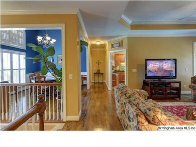 View of living, dining room, and hall toward Maste