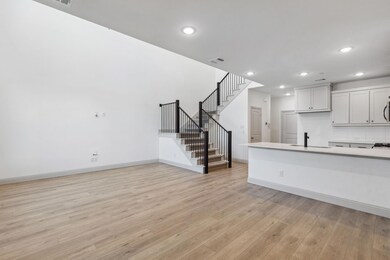 Open metal railing on your new staircase continues