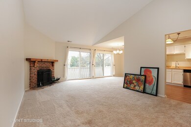 Very large living space with aulted ceiling.  Wood