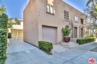 Triplex is tucked behind 8317 Waring Ave.