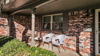 View of patio with a porch