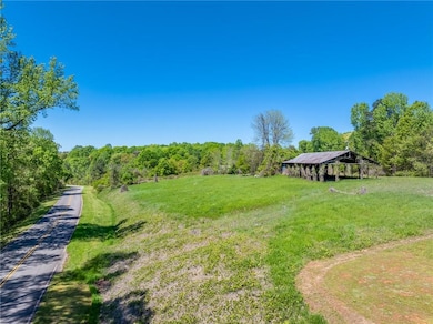 View of yard featuring a forest view