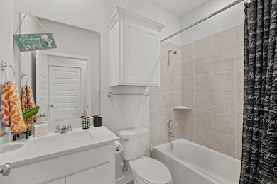 Stylish downstairs guest bathroom boasts oversized