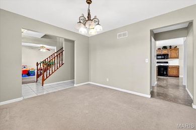 With a hallway leading to the kitchen!