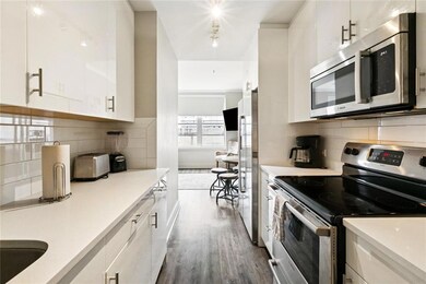 Kitchen looking out to living space