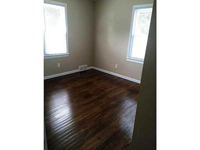 Bedroom. Main Floor Bedroom #3 with refinished Har