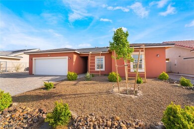 Ranch-style home featuring fence, driveway, stucco