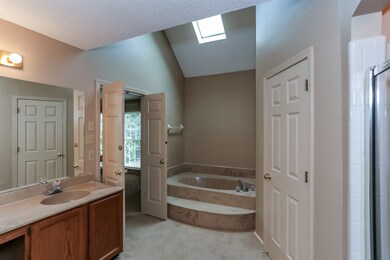 The spa like master bath features a whirlpool tub,