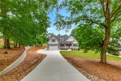 Front of home with long driveway