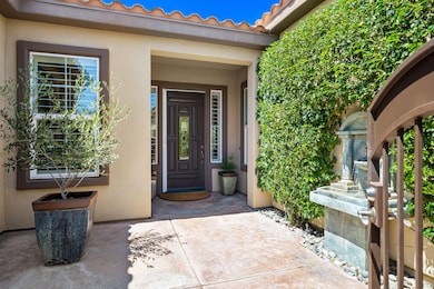 courtyard entrance with tranquil fountai