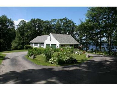 Exterior Front. Paved Loop Driveway...
