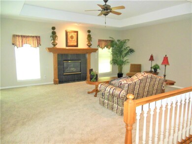 Great Room With New Carpet and Paint
