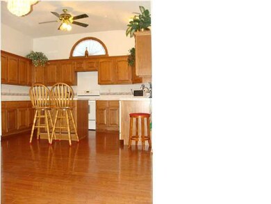 Huge kitchen. Lots of cabinets and counter space. 