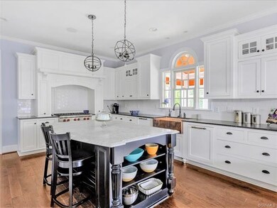 Center island with room for bar stools, cook books