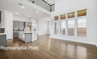 Kitchen featuring tasteful backsplash, a center is