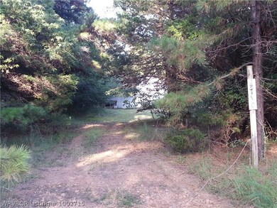 out at the road looking down driveway