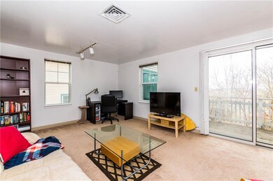 Living Room (20x13). Exit to expansive rear deck.