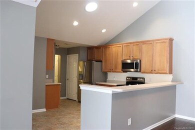 Kitchen with breakfast nook and bar