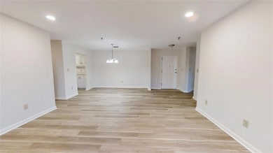 Spare room featuring recessed lighting, baseboards