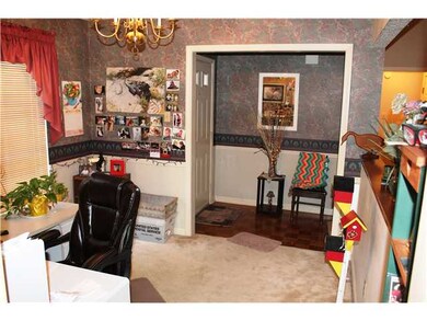 Foyer with parquet floors.