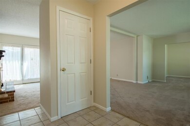 Coat closet in entry foyer.