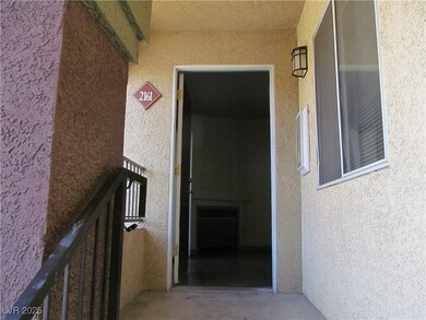 Entrance to property featuring stucco siding