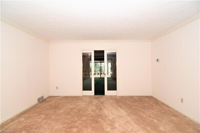 Glass pocket doors from living room to family room