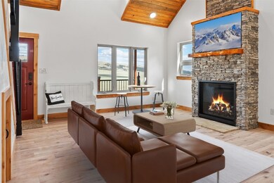  
Virtually staged Great Room with stone surround