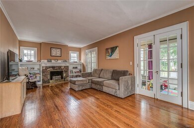 The living room leads to the family room through t