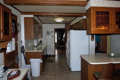 KITCHEN WITH BREAKFAST BAR, PANTRY CUPBOARD IN HAL
