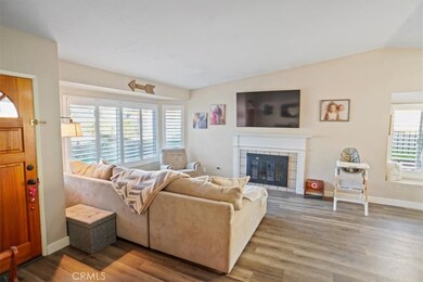 open living room with hard to find wood buring fireplace
