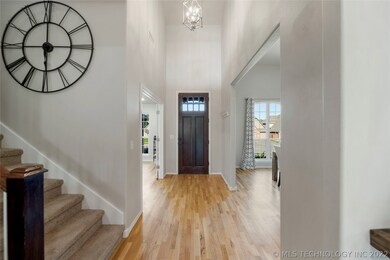 Study and formal dining room flank the inviting tw