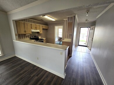 Kitchen featuring stainless steel range with elect