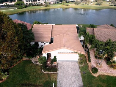 Front of House & Lake in Back